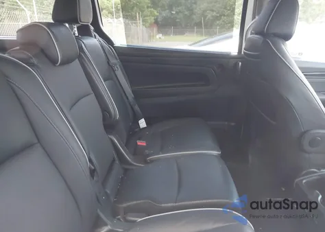 2023 Honda Odyssey Elite z USA, uszkodzony, nr VIN 5FNRL6H97PB047753